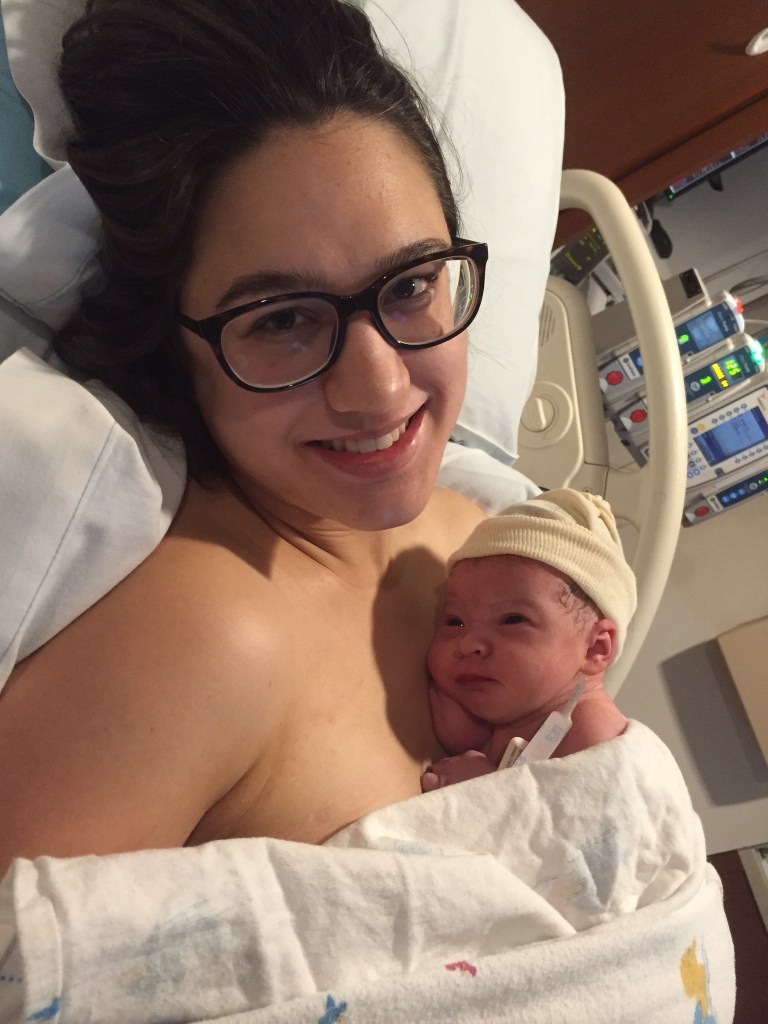 Natural Hospital Birth. Baby on moms chest.